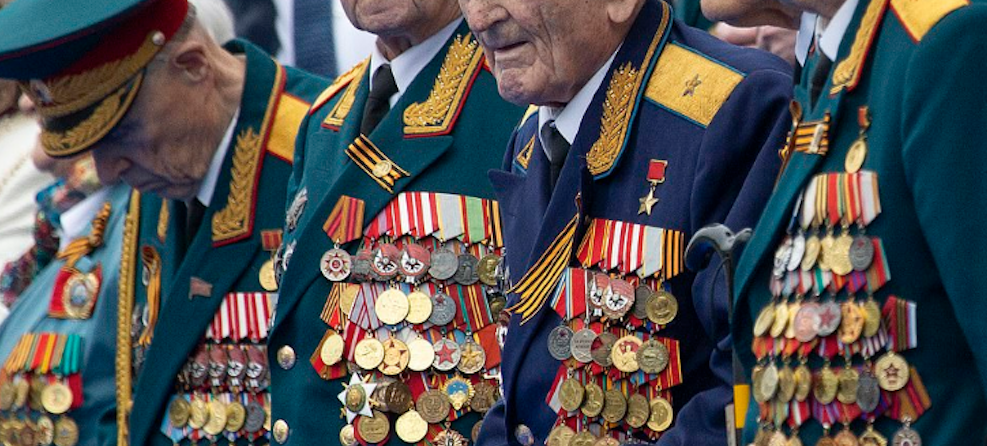 Russian Cold War and WWII military veterans display their hard-earned medals in Cremlin