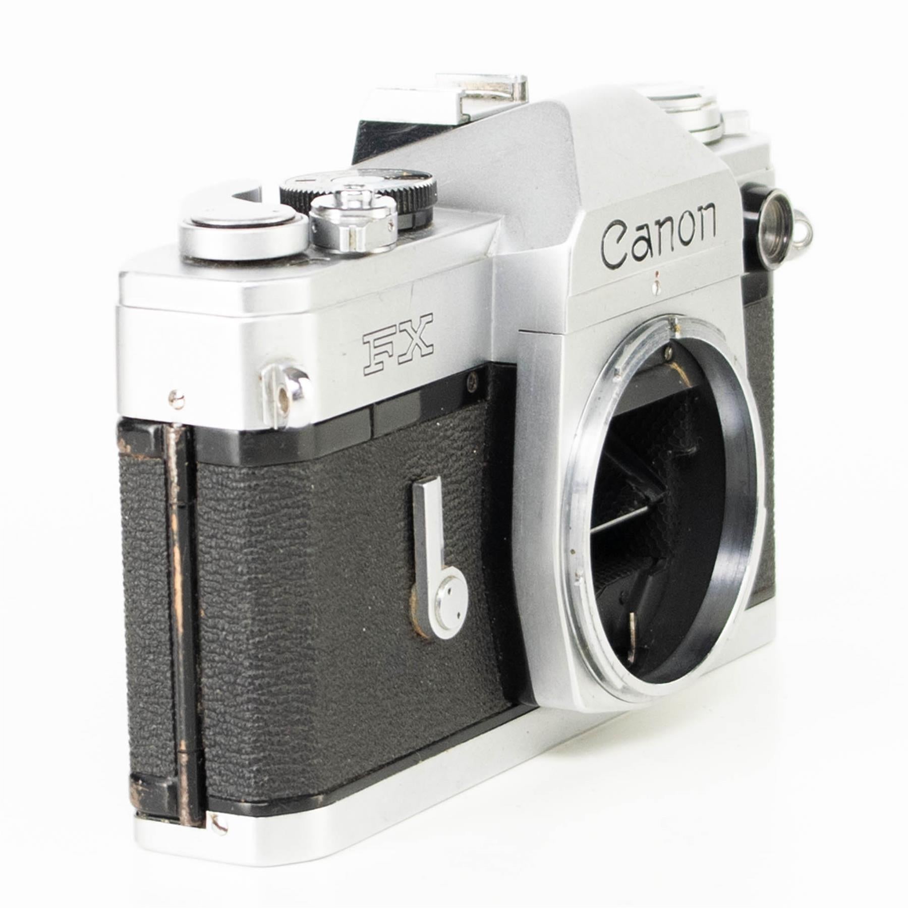 Canon FX Camera | Canon FL 50mm f1.8 lens | White | Japan | FD mount | 1964